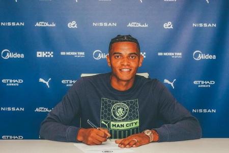 Man City bolster defence by signing Dortmund's Akanji