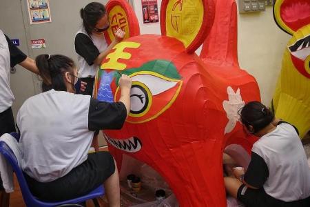 Female prison inmates create tiger lanterns for Gardens by the Bay's Mid-Autumn Festival