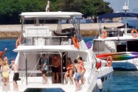 Singaporean who let 10 people party on yacht in 2020 fined for lying about group size