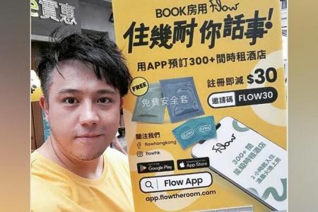 Scandal-plagued Boyz singer Steven Cheung hands out condoms, fliers