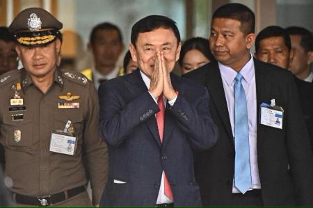 Thaksin returns to Thailand after 15 years of self-exile, hours before Parliament decision on premiership