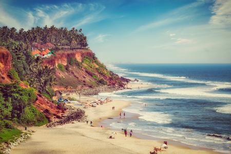 The silky sands of Varkala Beach are perfect for both thrill-seekers and beach bums alike. 