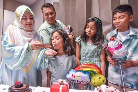 ‘We definitely did not plan it!’: Couple celebrates four children born on the same day  