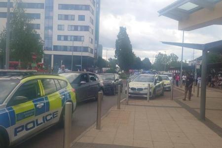 Man arrested after two stabbed at London hospital 