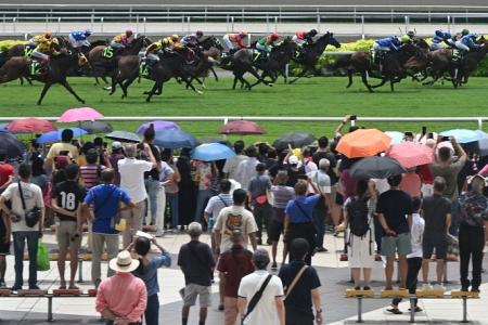 Thousands gather to witness final horse races at Turf Club