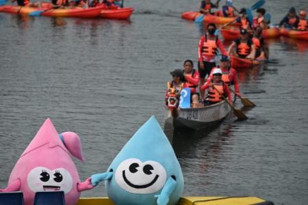 Dragon boaters and S'pore Children's Society beneficiaries team up to clean Lower Seletar Reservoir