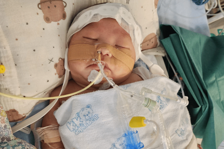 Month-old baby with heart defect had 2 strokes, parents raising money for treatment