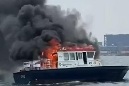 One taken to hospital after boat catches fire in western Singapore port waters