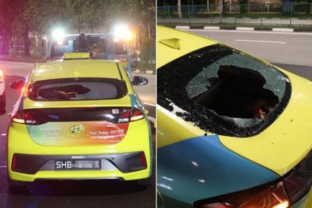 Cabby and son injured after man throws rock at car windshield in Jurong