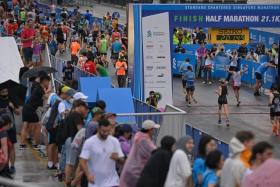 Participants running the half-marathon at the Standard Chartered Singapore Marathon on Dec 4, 2022.
