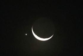 Last Friday, Venus was clearly visible from the Republic, sidling up to the new crescent moon and seeming to almost touch it. 