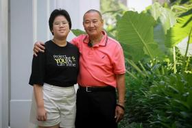 Mr Lee Kia Por with his daughter Ruby Lee Hui Ying. They received help from CDAC on multiple fronts.