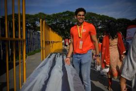 Third Sergeant Ashok Kumar, who extended his national service by about two weeks, helps to maintain more than 1,000 props at the NDP show. 