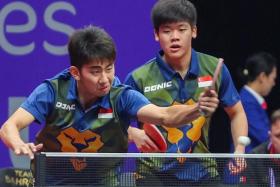 Koen Pang (left) and Izaac Quek competing in the men&#039;s doubles table tennis competition at the Hangzhou Asian Games in 2023.