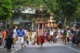 The devotees performing penitential acts on their walk of faith for Hindu god Lord Murugan.