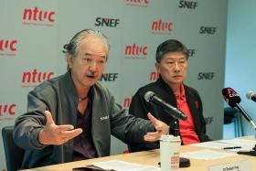 SNEF president Robert Yap (left) and NTUC Secretary-General Ng Chee Meng speaking to members of the media at the Pre-Budget 2024 Media Session.