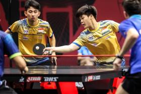 Koen Pang (left) and Izaac Quek en route to reaching the men&#039;s doubles quarter-finals during the WTT Singapore Smash in March.