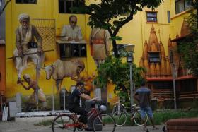 A wall mural documenting the history of the Arya Samaj Singapore, which is situated at the back of the building and was a part of a project supported by the NHB grant scheme.