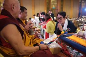 Jet Li (in black) was at the Thousand-Armed Avalokiteshvara Grand Puja 2024 at Sands Expo and Convention Centre. 