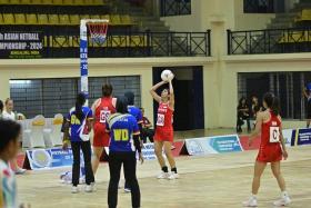 Singapore goal-attack Amandeep Kaur Chahal attempting a shot in the Republic&#039;s semi-final win over Malaysia at the Asian Netball Championship on Oct 26, 2024.