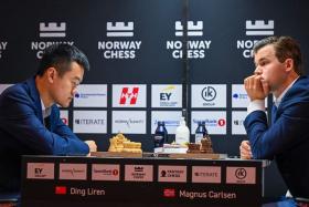 Chinese chess grandmaster Ding Liren (left) plays against Norweigen chess grandmaster Magnus Carlsen during the Norway Chess 2024 on May 27.