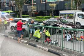 A 54-year-old male taxi driver and a 35-year-old male car driver were taken conscious to Tan Tock Seng Hospital.
