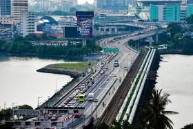 Car travellers leaving Singapore during peak periods had to wait up to three hours to clear immigration, due to traffic tailback from Malaysia, said ICA.