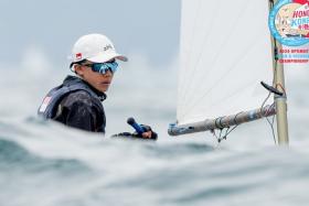 Singaporean sailor Ethan Chia comes from behind to retain his title at the Optimist Asian and Oceanian Championships in Hong Kong.