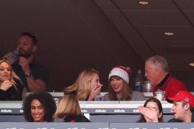 Pop star Taylor Swift and her father Scott (right) attending a Kansas City Chiefs National Football League game on Dec 17, 2023.