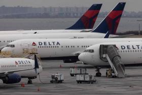 A Delta Air Lines flight was two hours into its journey to Barcelona when it had to return to Atlanta over a "biohazard".