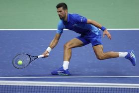 Novak Djokovic returning a shot against Daniil Medvedev of during their US Open final.