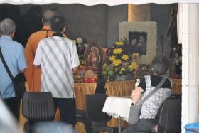 Relatives and friends attending the wake of an elderly couple who died at home together, at a funeral parlour in Sin Ming Drive, on Jan 6.