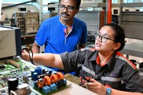 Engineering student Nur Arfa Taqiah Mohamad Noor Azhar (right) is one of the first four students benefiting from the Enabling Pathway Programme.