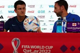 Soccer Football - FIFA World Cup Qatar 2022 - England Press Conference - Main Media Center, Doha, Qatar - November 24, 2022 England manager Gareth Southgate and Harry Maguire during a press conference REUTERS/Gareth Bumstead/File Photo