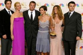 FILE PHOTO: David Schwimmer, Lisa Kudrow, Matthew Perry, Courteney Cox Arquette, Jennifer Aniston and Matt LeBlanc of \"Friends\", appear in the photo room at the 54th annual Emmy Awards in Los Angeles, U.S., September 22, 2002. REUTERS/Mike Blake/File Photo