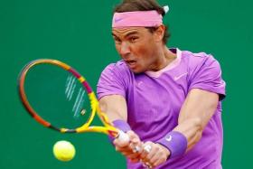 FILE PHOTO: Tennis - ATP Masters 1000 - Monte Carlo Masters - Monte-Carlo Country Club, Roquebrune-Cap-Martin, France - April 16, 2021 Spain's Rafael Nadal in action during his quarter-final match against Russia's Andrey Rublev REUTERS/Eric Gaillard/File Photo