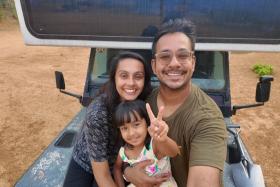 Mr Ritesh Angural, Ms Nisha Hari Singh, and their daughter, Arisha, in Nong Khiaw, a village in northern Laos. 