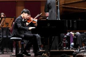 National serviceman Joshua Lau Jin Quan, a supreme figure of composure in Beethoven’s Second Piano Concerto in B flat major (Op.19) was the first prize winner. 