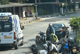 In photos of the aftermath of the accident posted on social media, a man can be seen lying on the road next to a fallen motorbike.