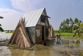 The “Khudi Bari” or “tiny houses” are resilient homes made on bamboo stilts rising out of the floodwaters that are also easy to move to safer locations when needed.