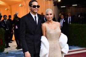 TV celebrity Kim Kardashian and comedian Pete Davidson arrive for the 2022 Met Gala in New York.