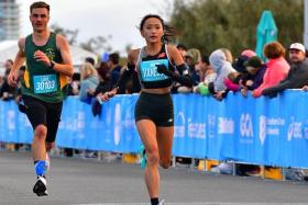 Vanessa Lee (right) set a 10km (road) national record after clocking 35min 55sec at the Gold Coast Marathon.