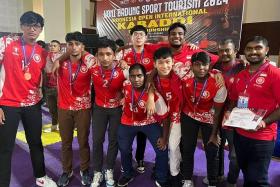 The national men&#039;s kabaddi team with their medals after clinching bronze at the Koni Badung Sports Tourism 2024 Indonesia Open International Kabaddi Championship. 