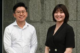 OCBC Jurong Point Branch&#039;s Mr Leong Wen Xian (left) and Ms Sara Lee, pictured on 7 April 2022.