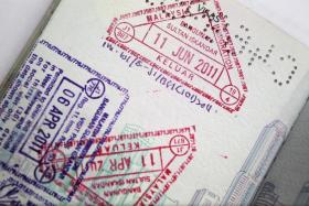 No more stamped passports - foreign visitors to Singapore to be issued ...