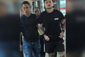 Singaporean Benny Kee Soon Chuan (right) was handed one charge of trafficking a controlled drug under the Misuse of Drugs Act. 