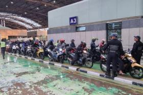 The offenders were caught after about 400 motorcyclists were checked at the land checkpoint, the police said on May 26. 