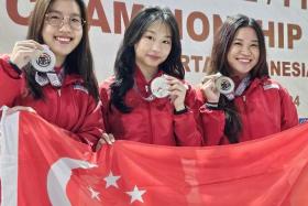 The trio of (from left) Fernel Tan, Natanya Tan and Martina Veloso clinched a silver at the Asian Rifle/Pistol Championship at the Senayan Shooting Range on Jan 10.