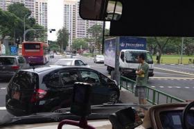 SHOCKING: Mrs Kaye Tan said the driver got out of the car in the middle of the road and walked over to the bus. He then knocked on the window and seemed to gesture to the bus driver to get out.