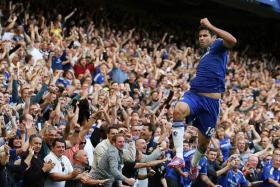 FANS&#039; TOAST: Diego Costa is flying high as Stamford Brodge&#039;s new-found darling. 